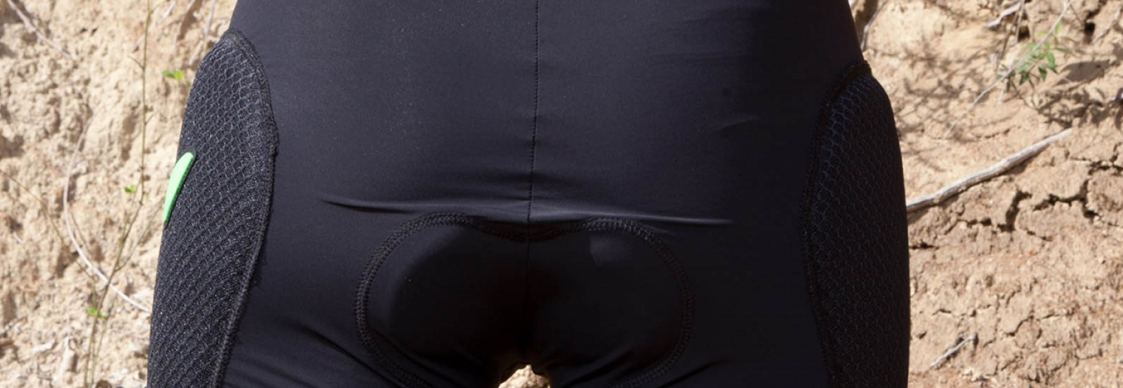 Protective cycling shorts with hip and coccyx padding for MTB and downhill